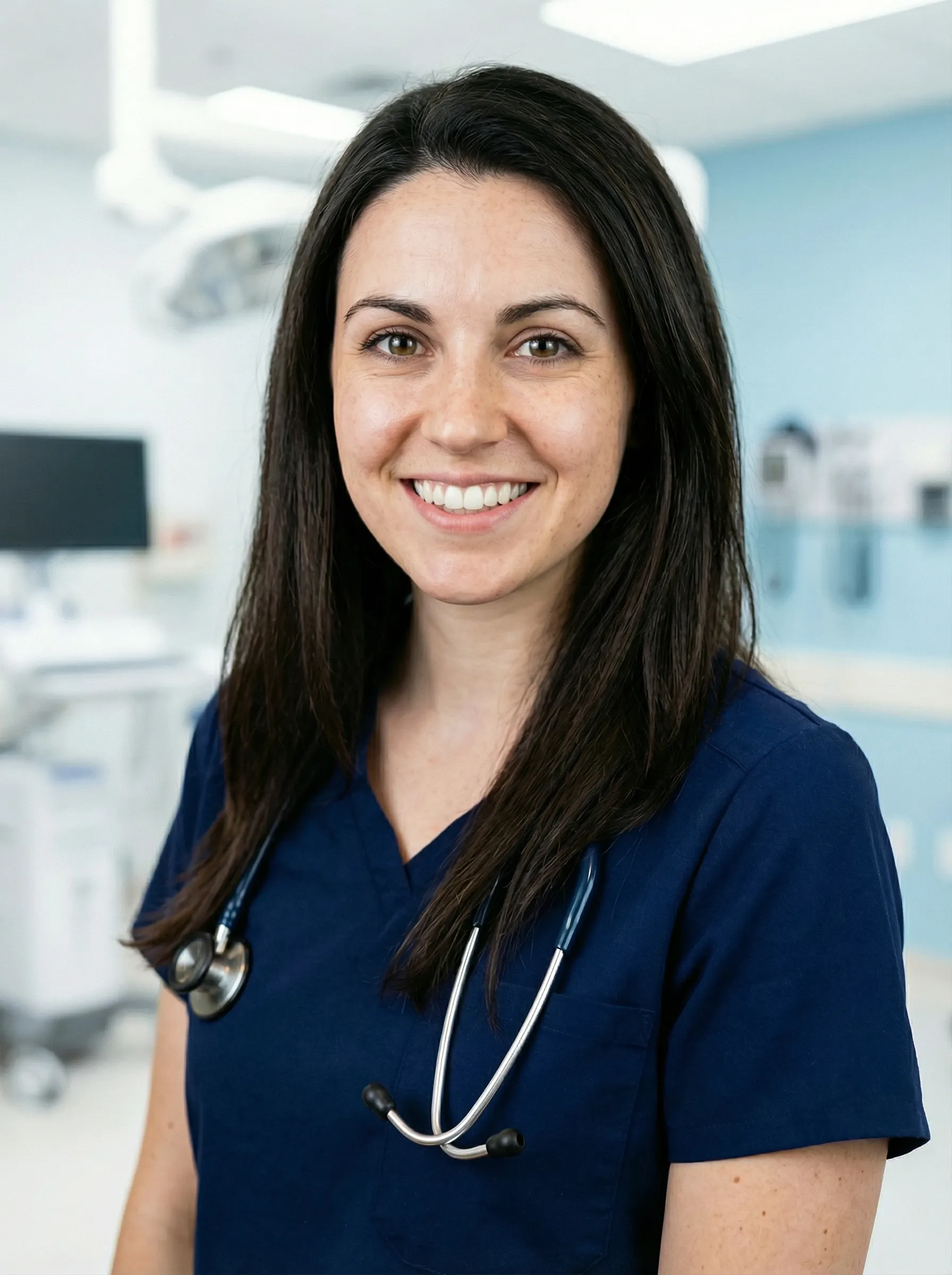 AI healthcare headshot — woman in navy scrubs with a stethoscope in an exam room
